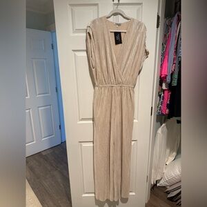 Elegant gold jumpsuit. Perfect for holiday parties